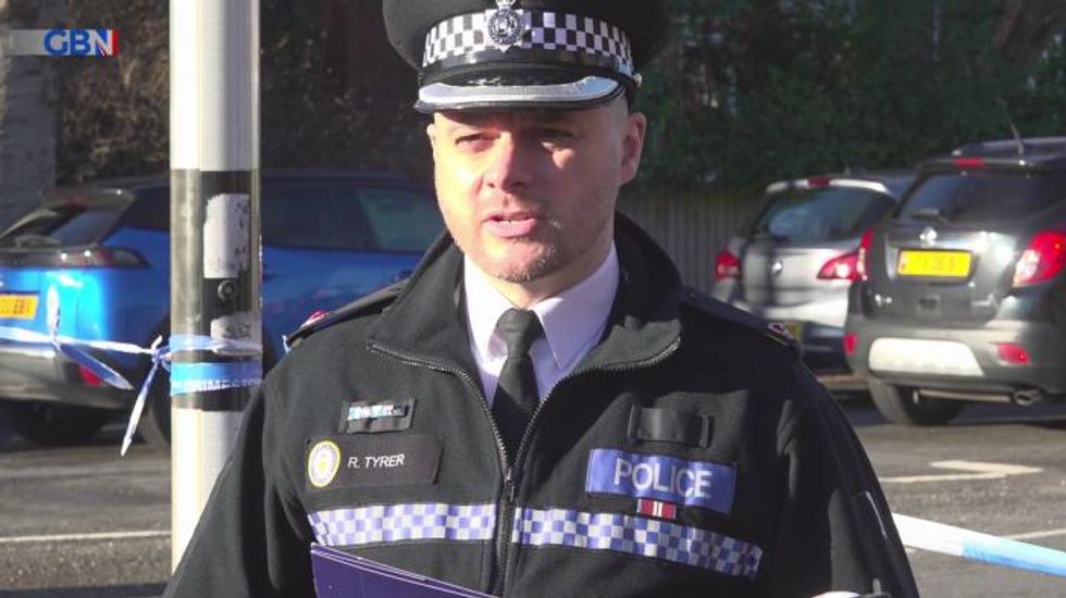 Armed police in fourth day of live stand-off with man who has eight-year-old son in house
