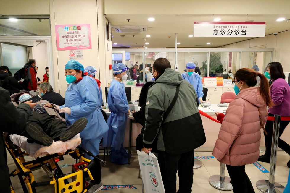 Covid: Emergency wards in China are 'overwhelmed' with Covid patients