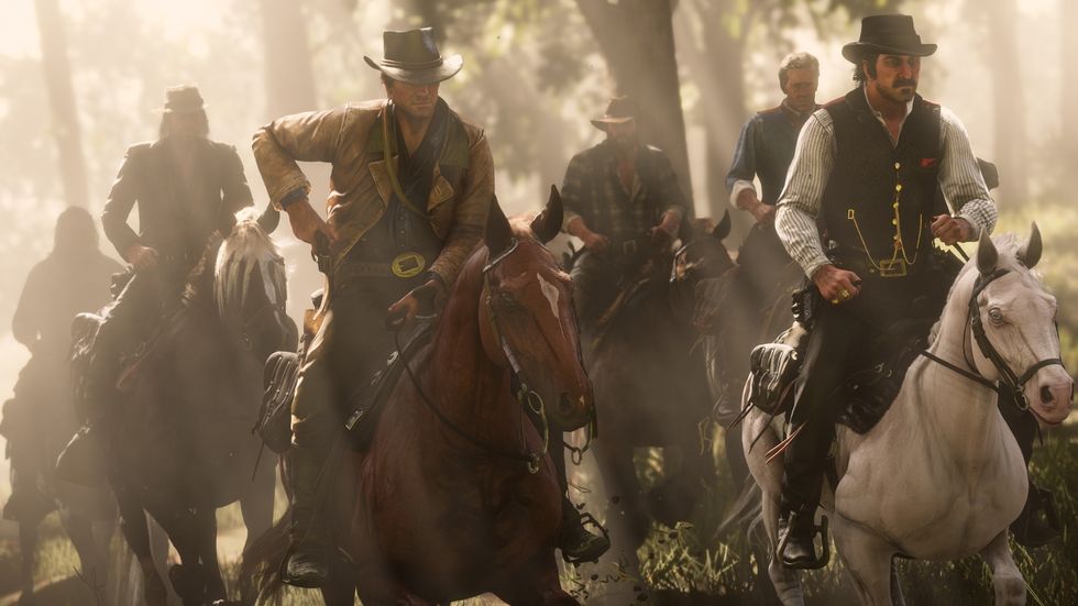 cowboys riding on horseback in red dead redemption 2 gameplay