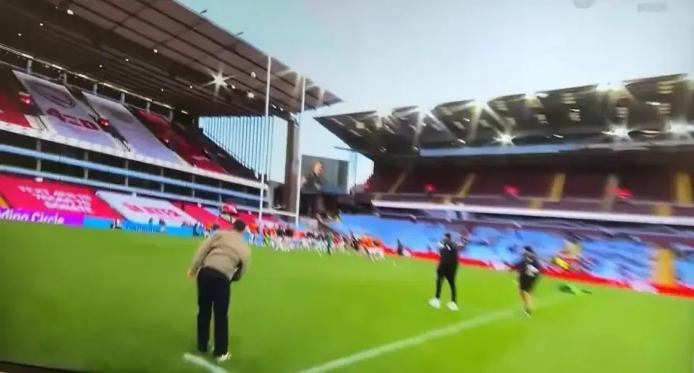 Furious rugby coach shoves TNT presenter live on air and orders him off the pitch in X-rated rant