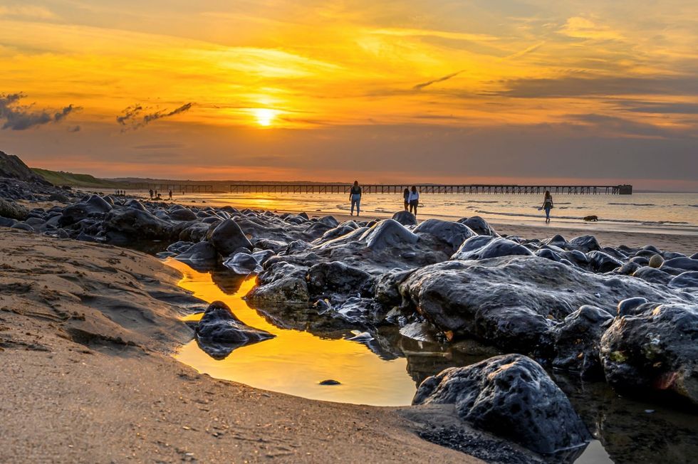 Britons told to avoid popular tourist beach after 150 WW2 grenades found