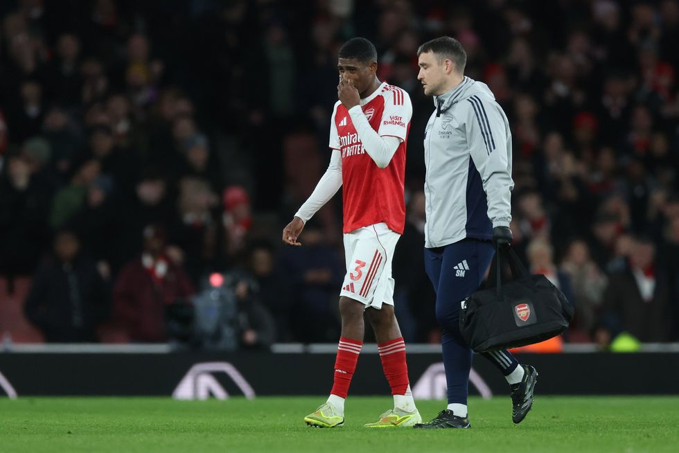 Cristhian Mosquera of Arsenal leaves the field with injury during the Premier League match between Arsenal and Brentford