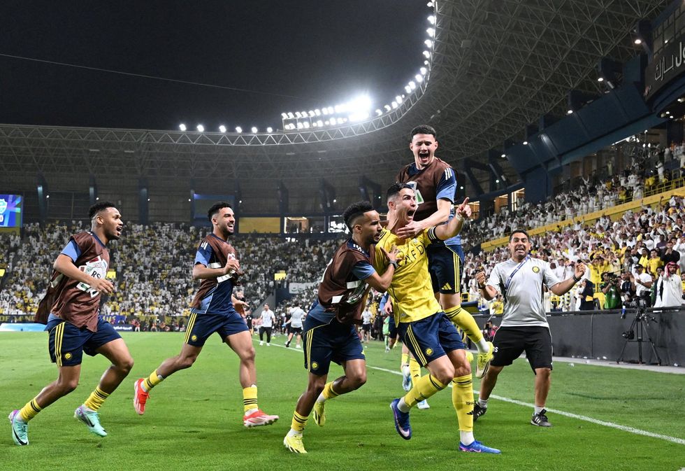 Cristiano Ronaldo celebrates his latest goal for Al-Nassr as he chases a first Saudi Pro League title