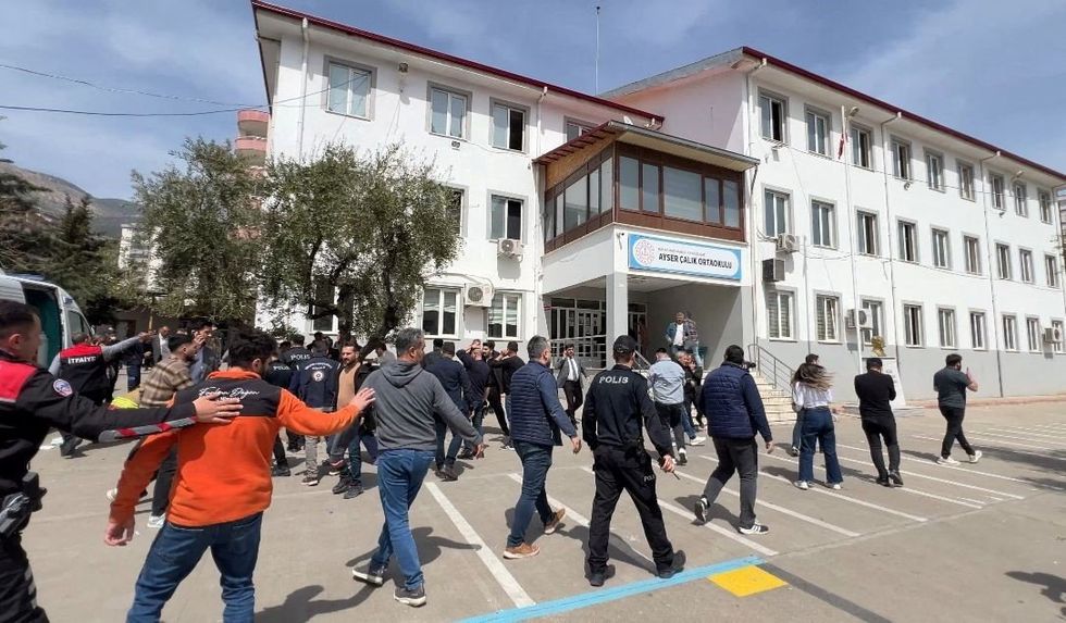 Crowds gathered outside the school gate in the Turkish province