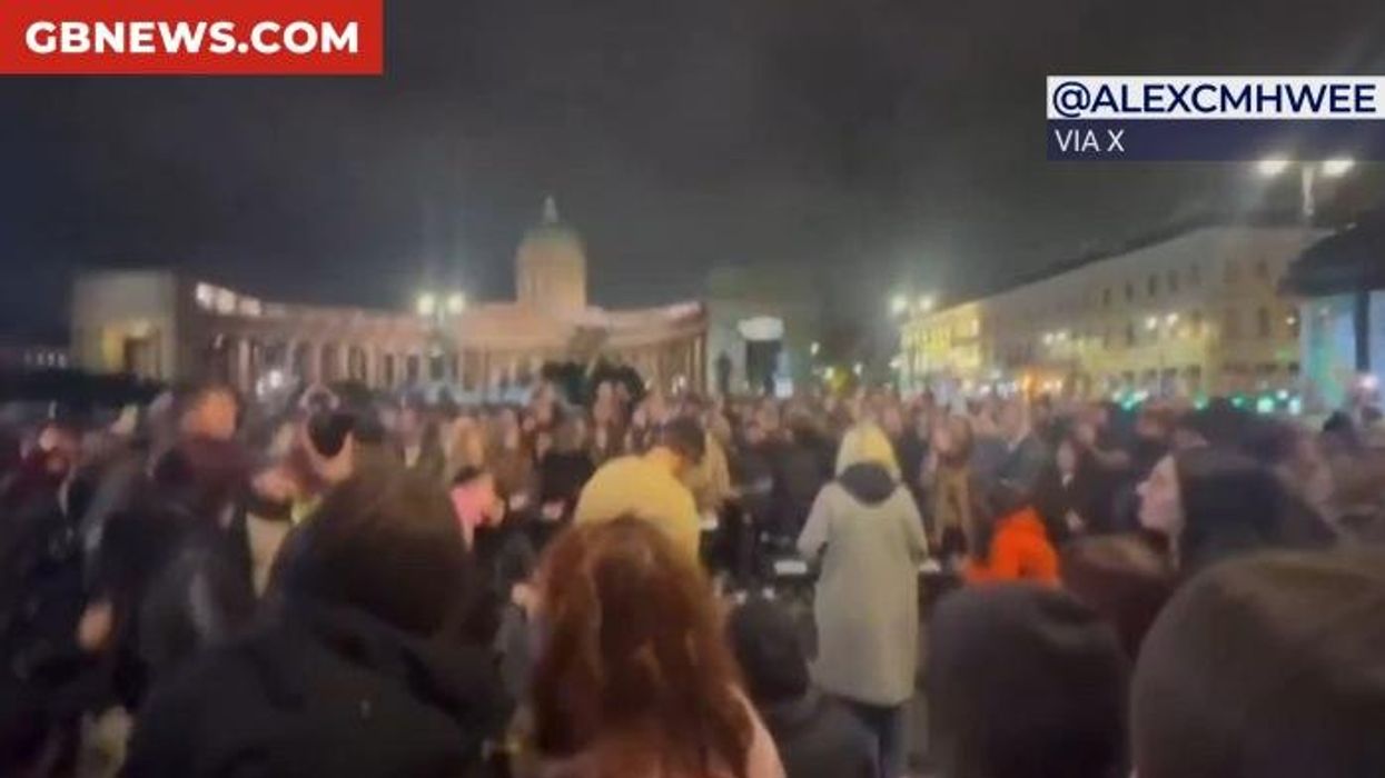Watch the moment that hundreds gather in St Petersburg to sing anti-Putin song