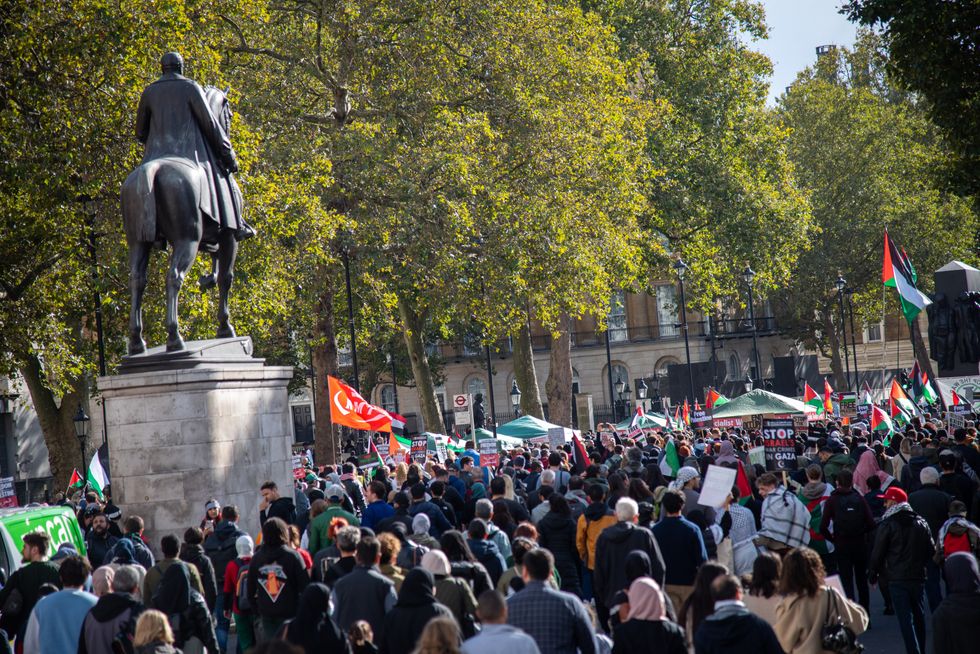 Crowds of protesters march during the National Demonstration - March For Palestine