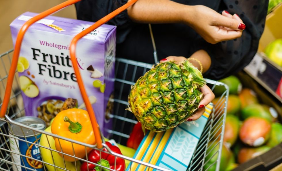 Crownless pineapple in shopping basket