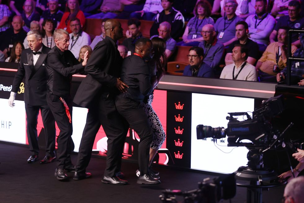Crucible security eventually ejected the woman after she protested the TV licence fee