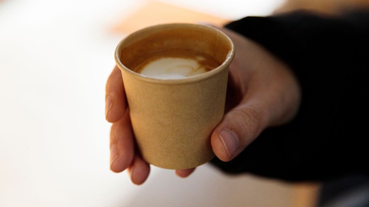 CUP OF COFFEE IN HAND