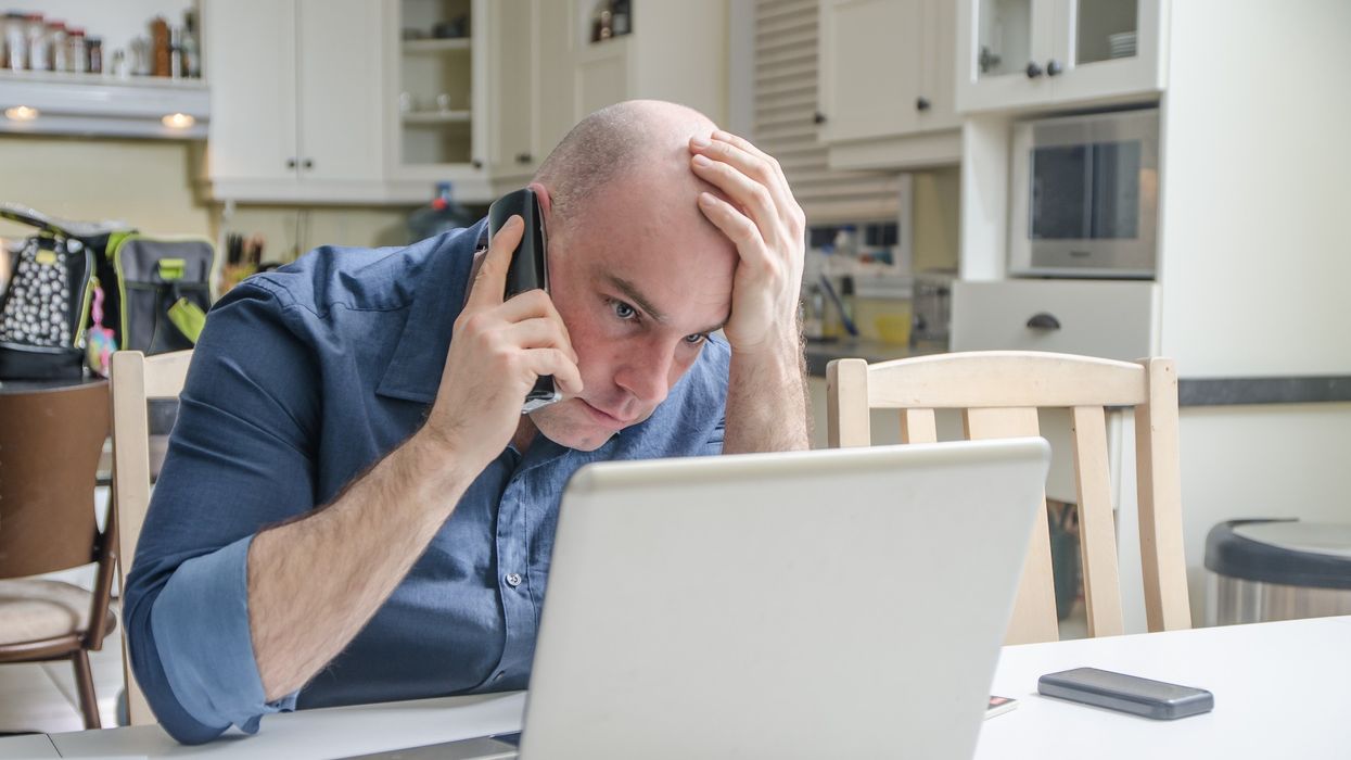 Customer worried at laptop
