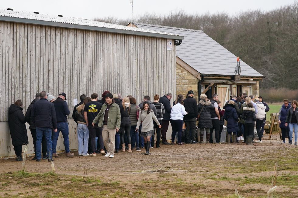 Customers queueing outside the farm shop