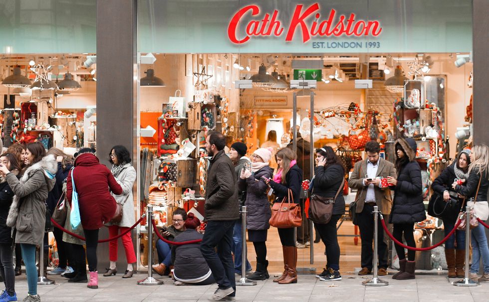 Customers queuing outside a Cath Kidston store in London