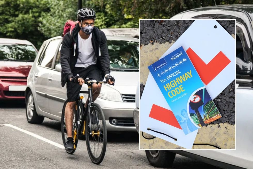 Cyclist and a copy of the Highway Code