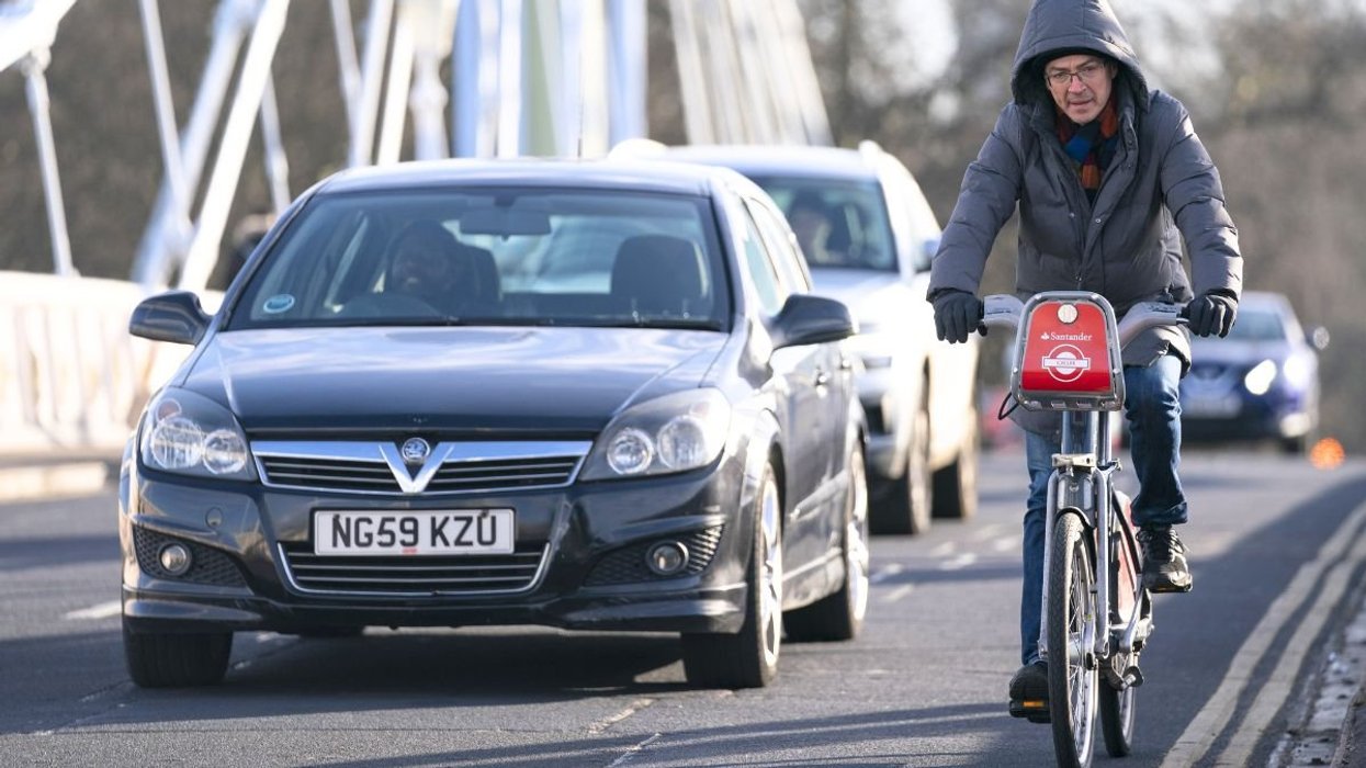 Cyclist driving in traffic