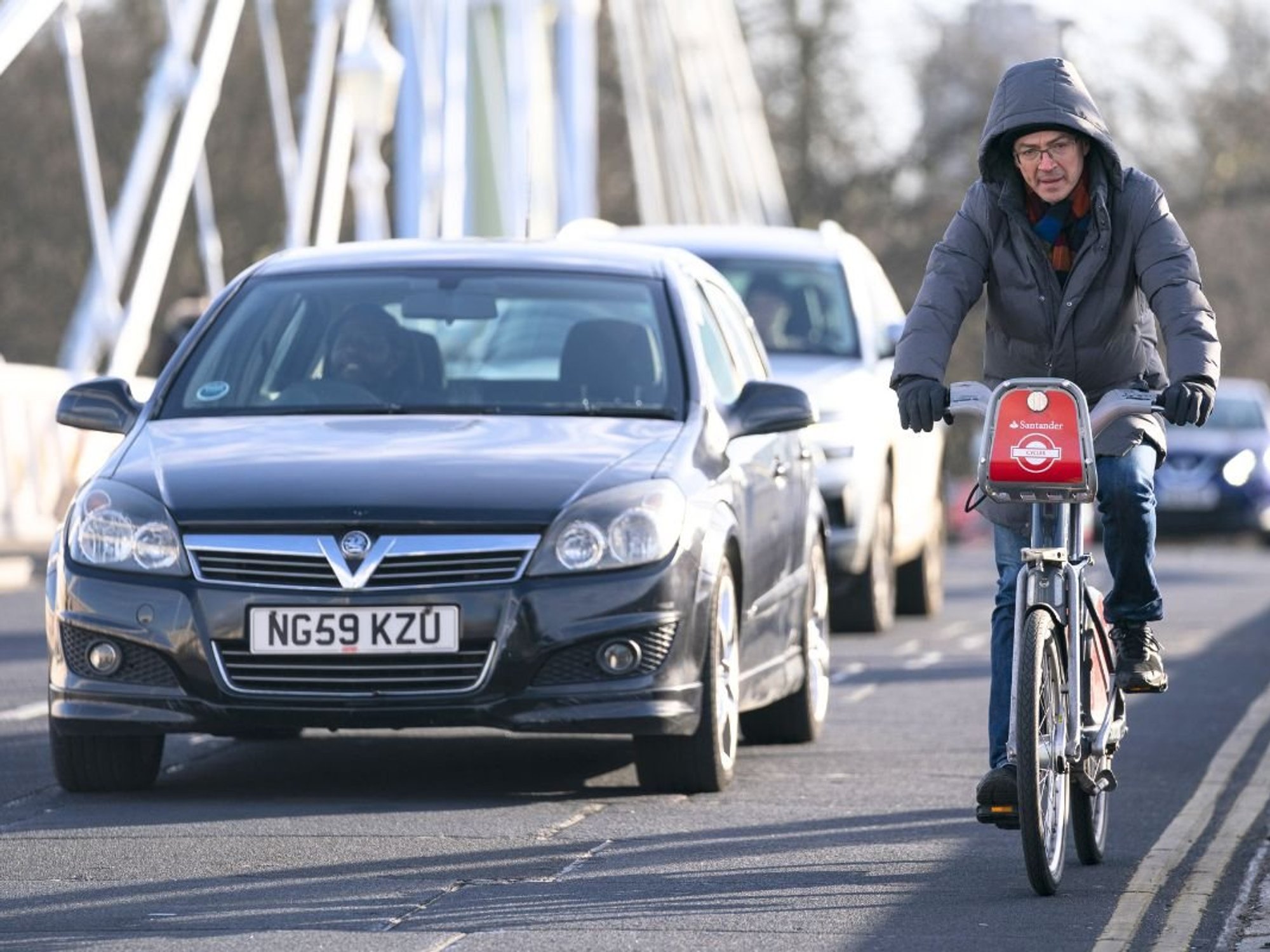 Cyclist driving in traffic