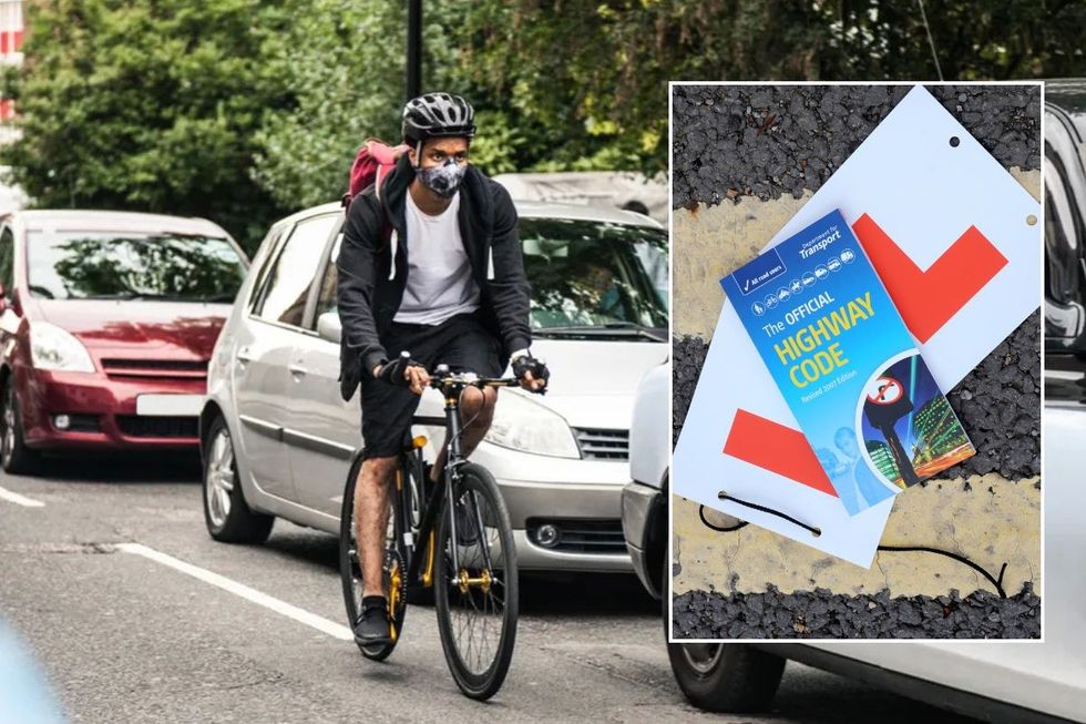 Cyclists in car traffic and a copy of the Highway Code