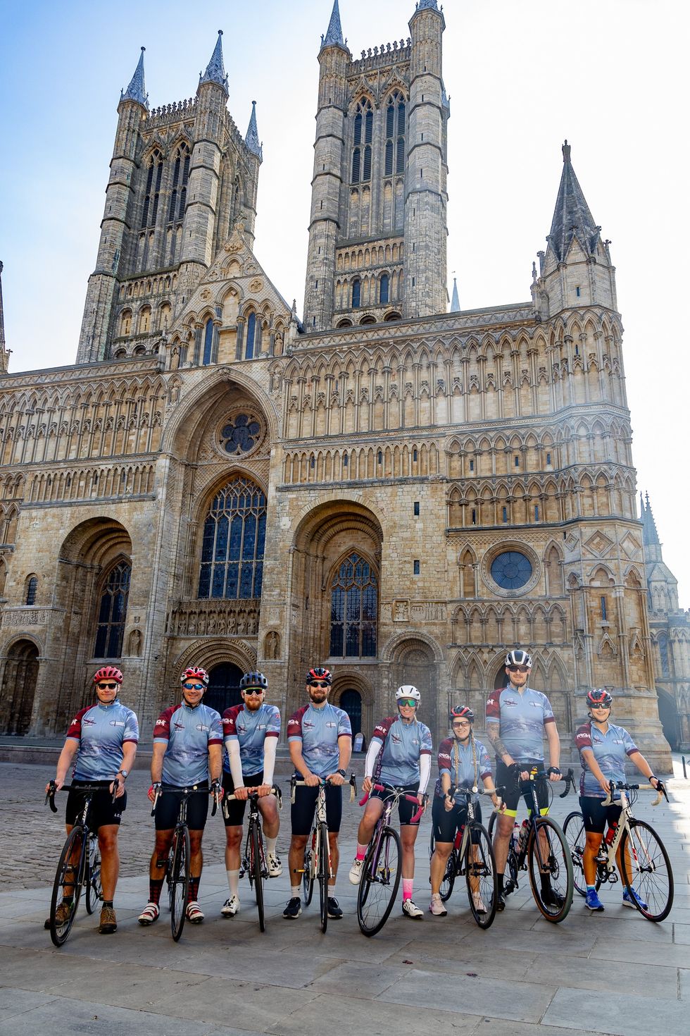 Cyclists outside Lincoln Cathedral