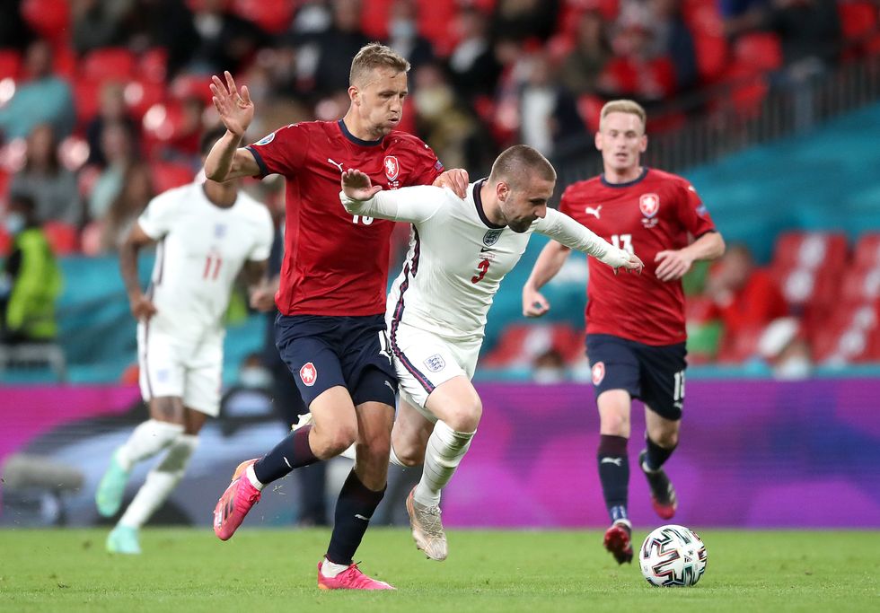 Czech Republic's Tomas Soucek (left) and England's Luke Shaw battle for the ball during the UEFA Euro 2020 Group D match at Wembley Stadium, London. Picture date: Tuesday June 22, 2021.