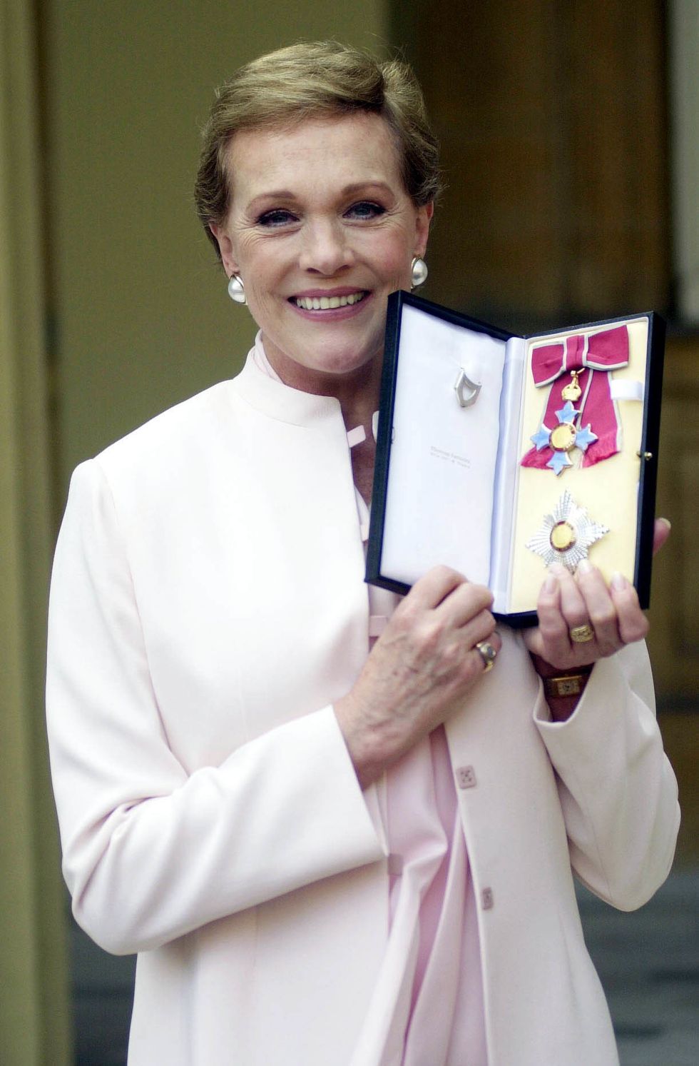 Dame Julie Andrews after receiving the honour of Dame Commander of the Order of the British Empire from Britain's Queen Elizabeth II at a ceremony held at Buckingham Palace, London.