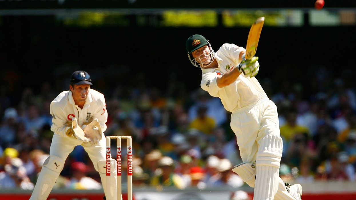 Damien Martyn of Australia straight drives during day one of the first Ashes Test Match between Australia and England at The Gabba on November 23, 2006