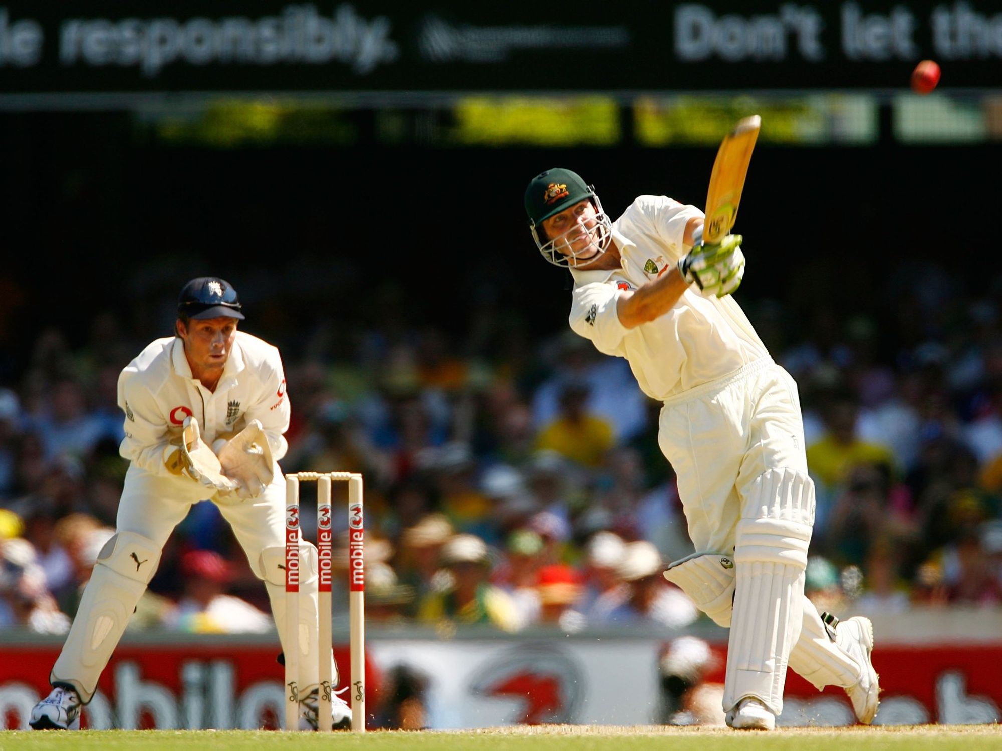 Damien Martyn of Australia straight drives during day one of the first Ashes Test Match between Australia and England at The Gabba on November 23, 2006