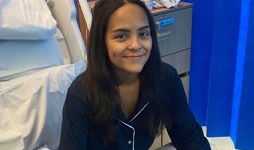 Daniella Thackray on a hospital bed