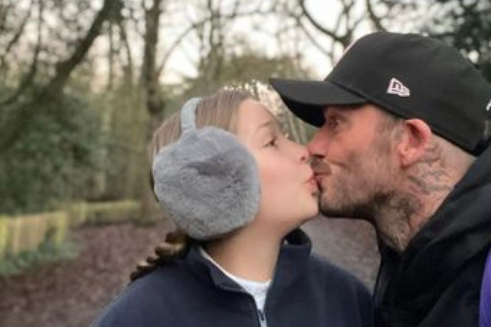 David Beckham kisses daughter Harper