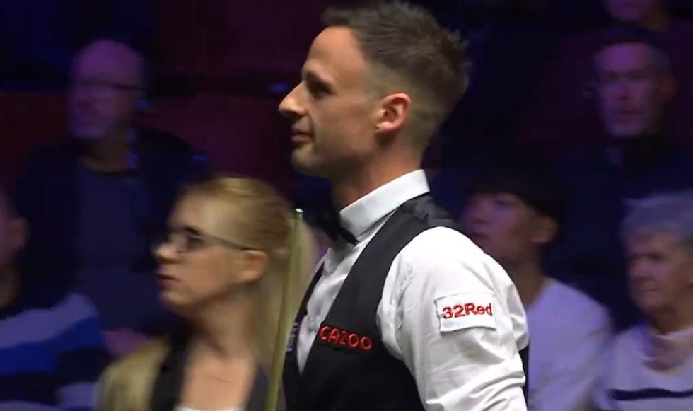 David Gilbert was just about to attempt a long pot before the interruption