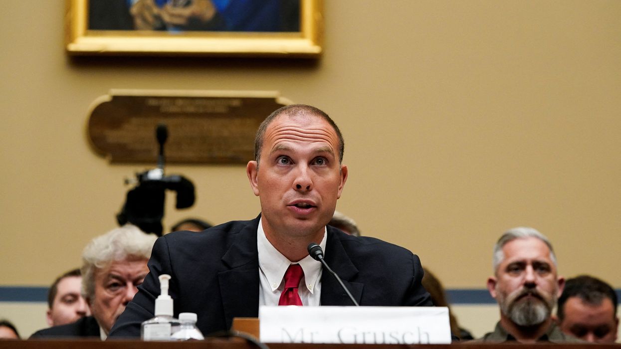 David Grusch, former National Reconnaissance Office representative on the Defense Department's Unidentified Aerial Phenomena Task Force, gives an opening statement during House Oversight & Accountability Committee's National Security, the Border, and Foreign Affairs Subcommittee's hearing on "Unidentified Anomalous Phenomena: Implications on National Security, Public Safety, and Government Transparency" at the U.S. Capitol Hill in Washington, U.S., July 26, 2023. 