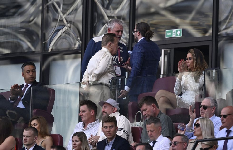 David Sullivan made a swift exit from the directors' box as furious West Ham supporters turned on the club's hierarchy following their devastating relegation from the Premier League