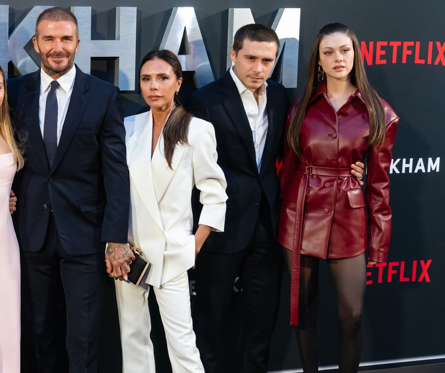 David, Victoria and Brooklyn Beckham with Nicola Peltz