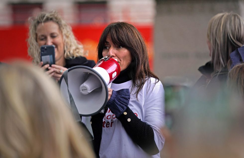 Davina McCall speaking to protesters outside the Houses of Parliament in London demonstrating against ongoing prescription charges for HRT (Hormone replacement therapy).