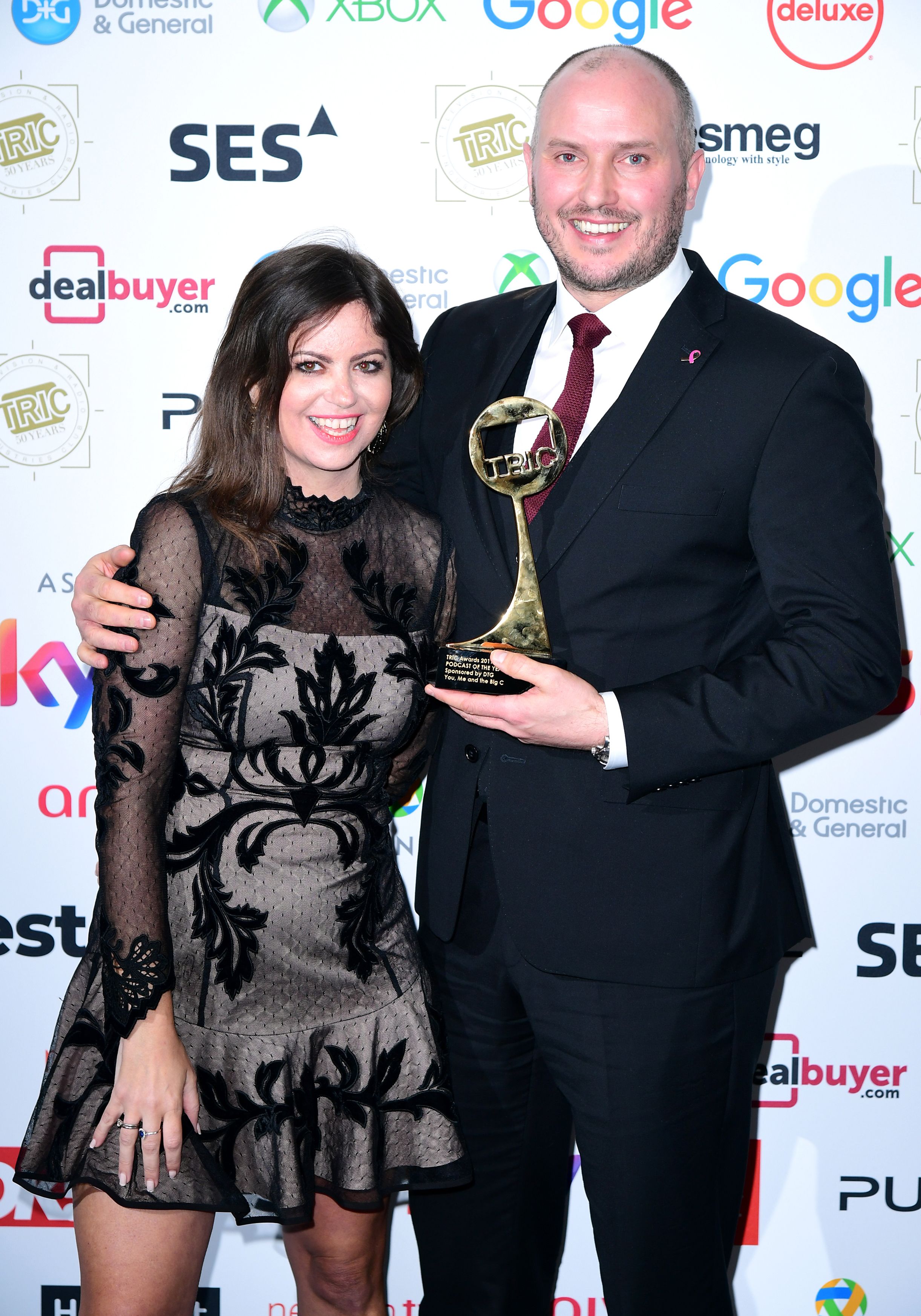 Deborah James and co-host Stephen Bland winning an award for podcast You Me and The Big C