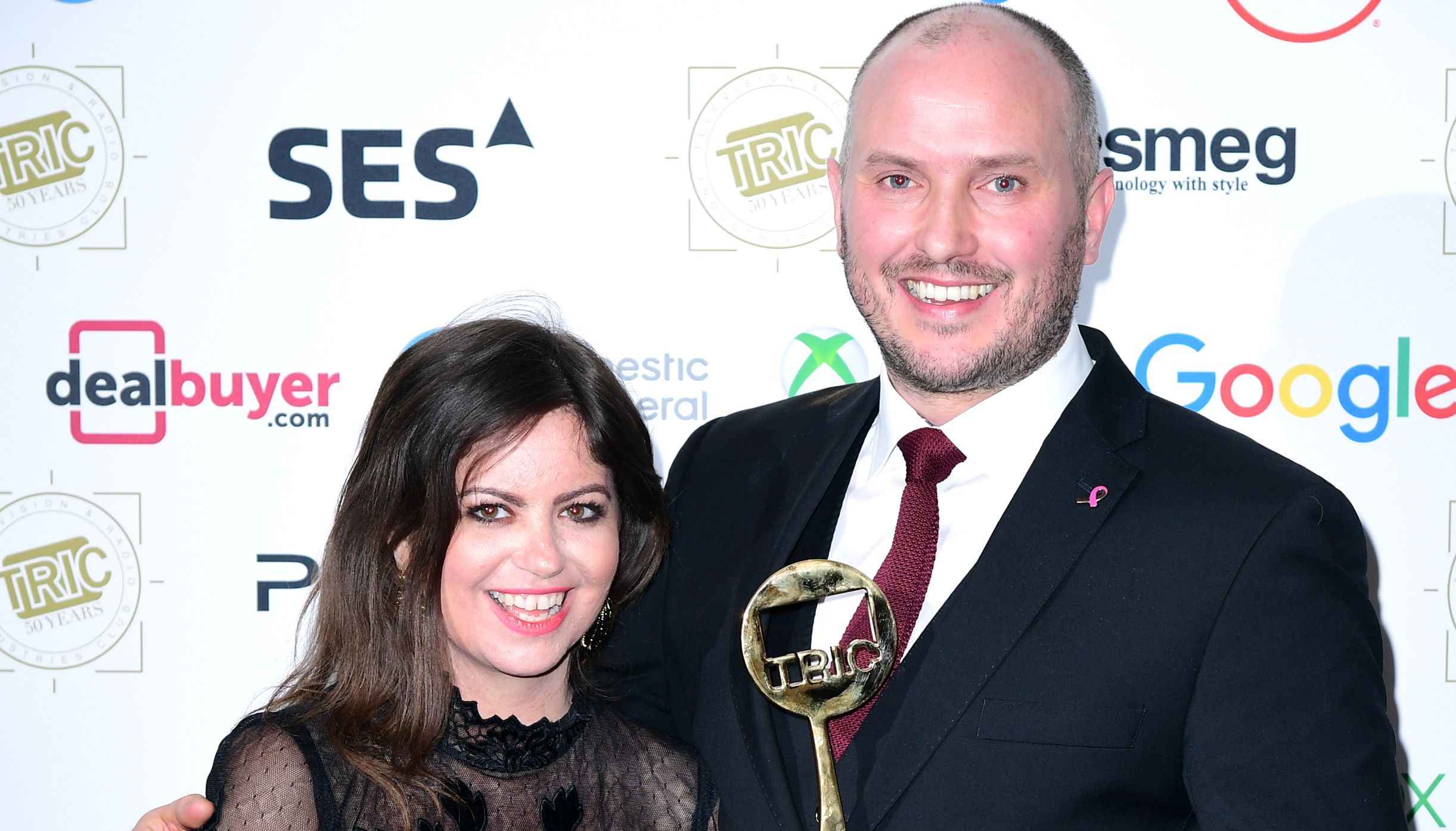 Deborah James and co-host Stephen Bland winning an award for podcast You Me and The Big C