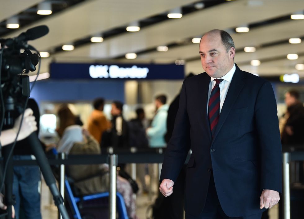 Defence Secretary Ben Wallace speaking to the media at Manchester airport after meeting members of the military as they cover for striking Border Force officers. Public and Commercial Services union (PCS) members working as Border Force officers at Gatwick, Heathrow, Birmingham, Cardiff, Manchester and Glasgow airports and the port of Newhaven resumed strikes on Wednesday for four days over pay, jobs and conditions. Picture date: Thursday December 29, 2022.