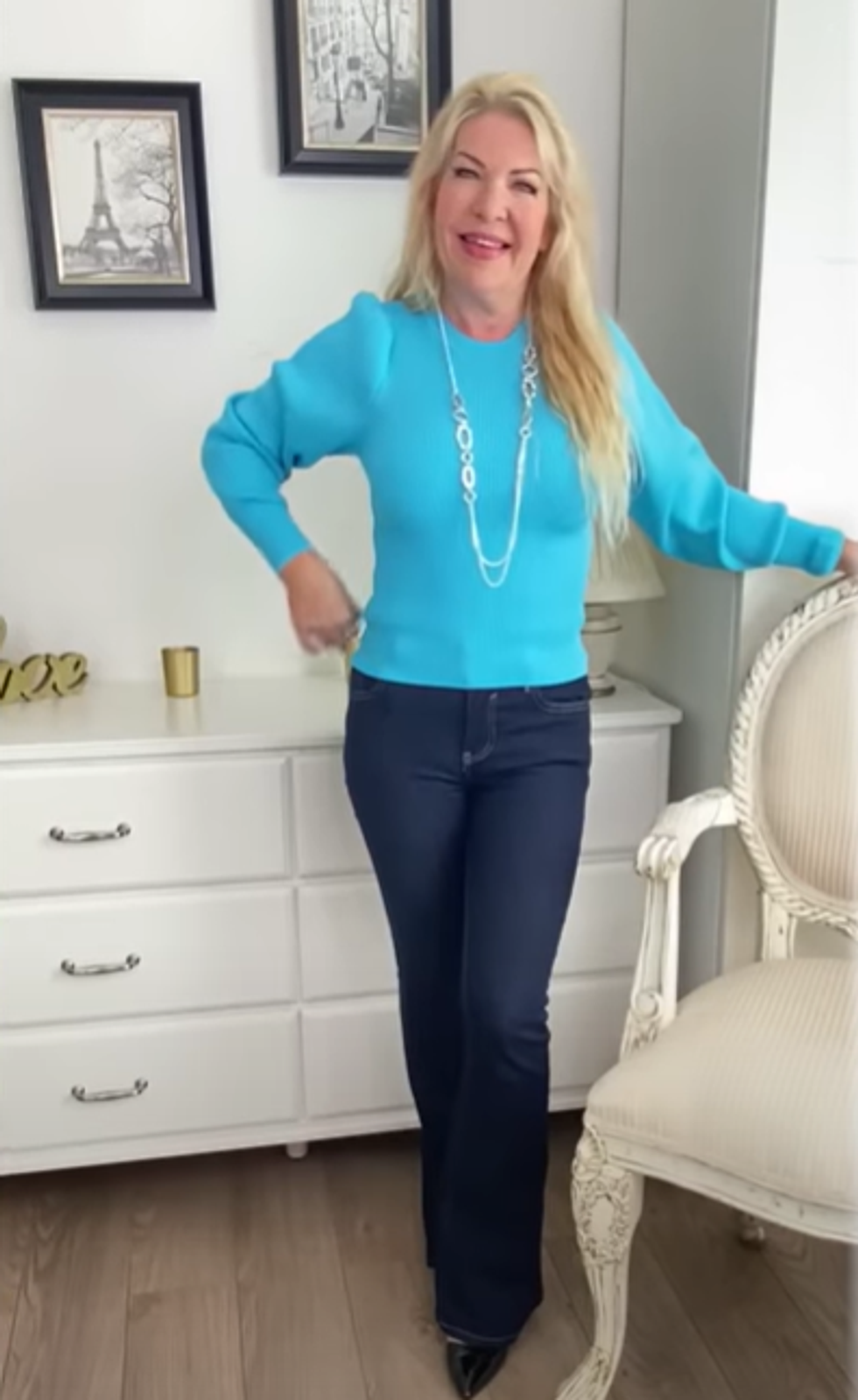 Deirdre from 50 & Fabulous with My Friend Deirdre wearing a blue jumper and dark navy jeans