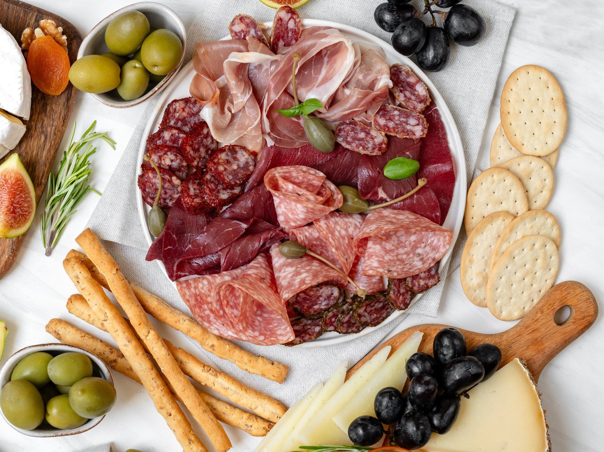 Deli meats, crackers, and fruit