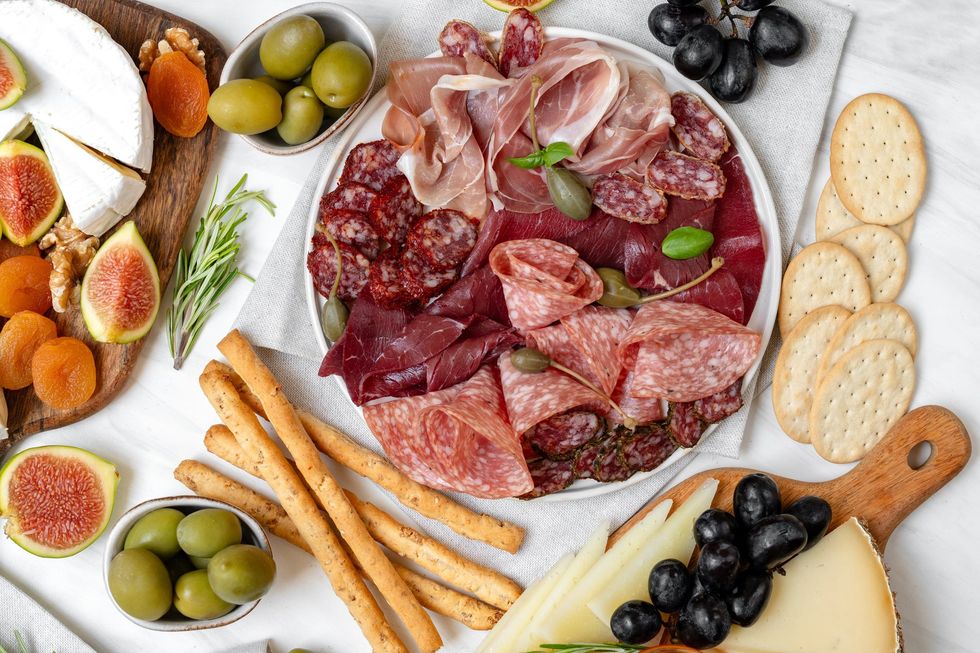 Deli meats, crackers, and fruit