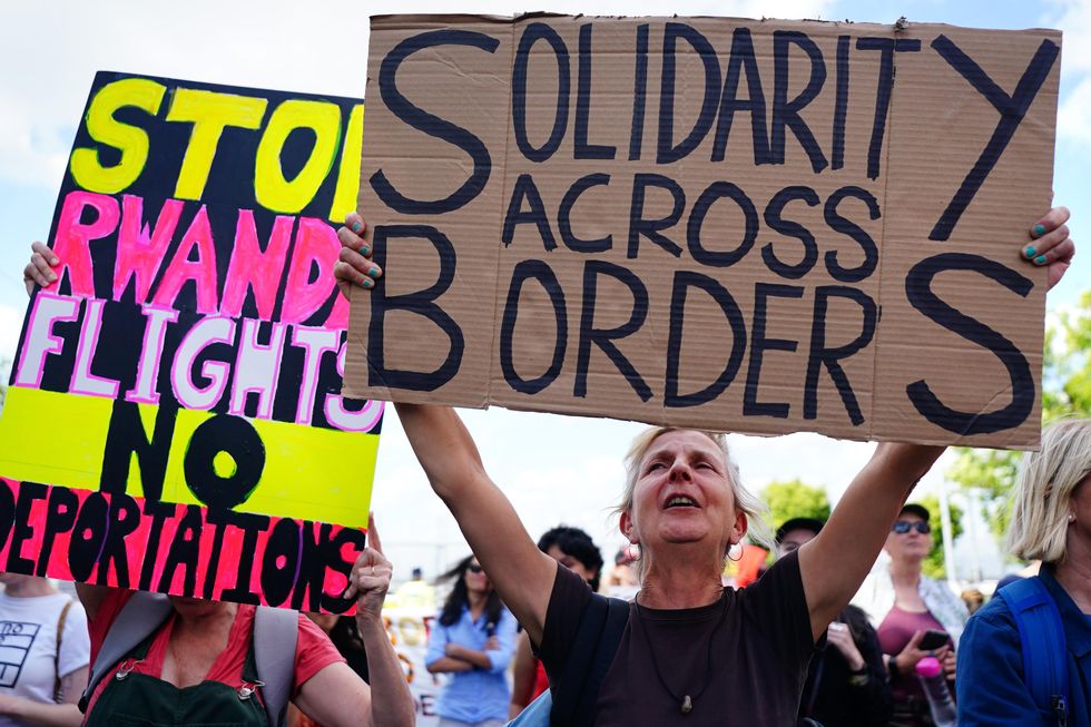 Demonstrators at a removal centre at Gatwick protest against plans to send migrants to Rwanda