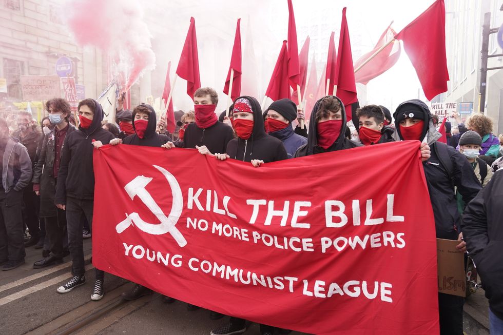 Demonstrators during a 'Kill The Bill' protest against The Police, Crime, Sentencing and Courts Bill in Manchester city centre. Picture date: Saturday January 15, 2022.