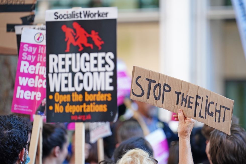 Demonstrators protest outside the Home Office in London against plans to send migrants to Rwanda