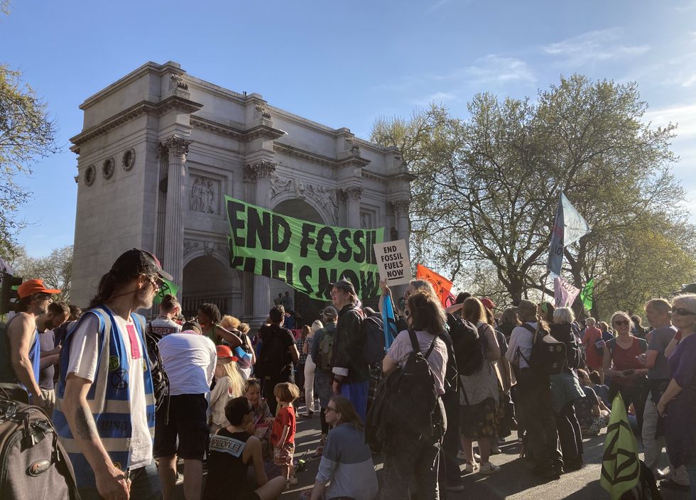 Demonstrators take part in an Extinction Rebellion protest at Marble Arch in central London.