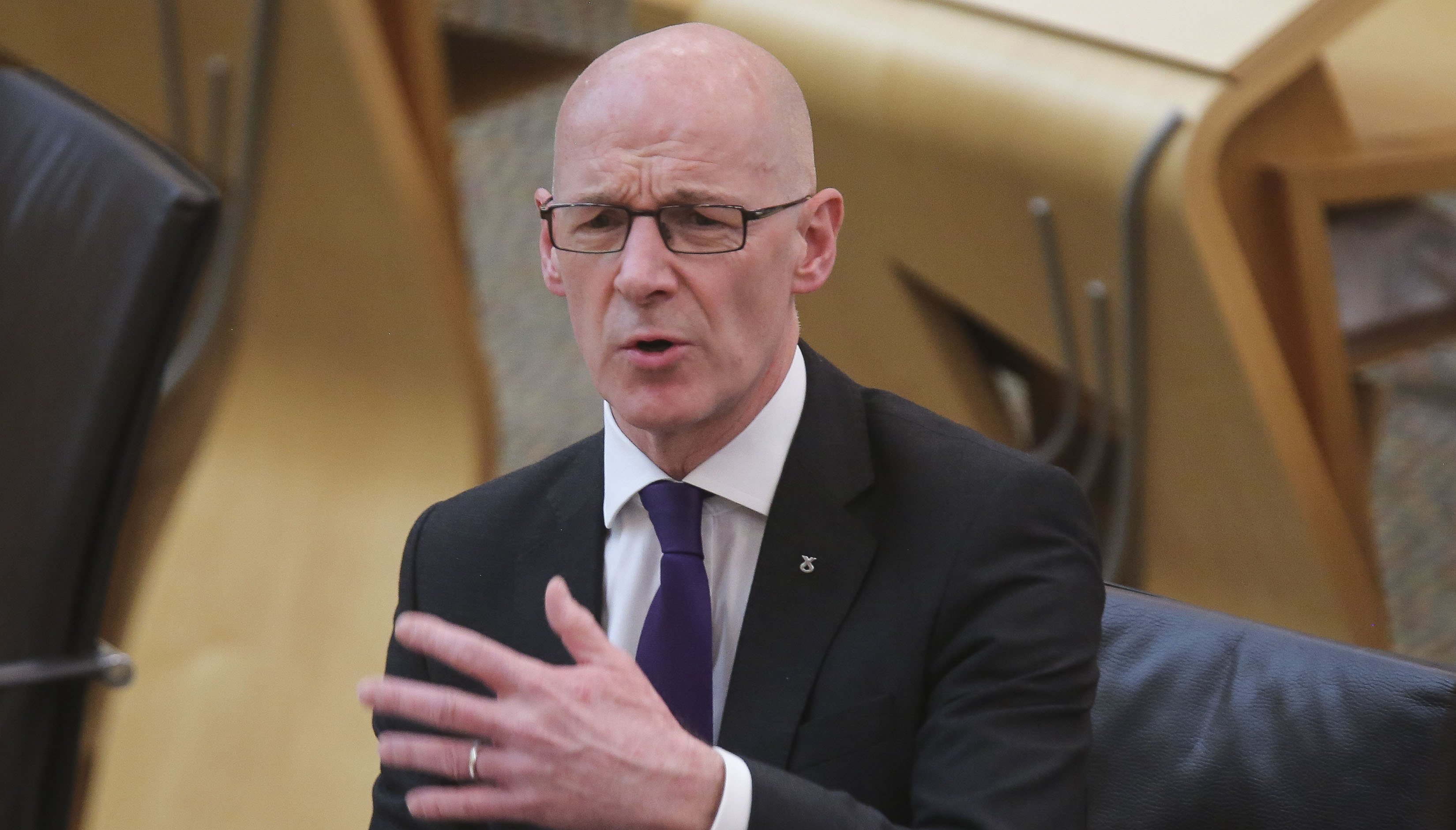 Deputy First Minister John Swinney during a debate about coronavirus vaccine passports, at the Scottish Parliament in Edinburgh.