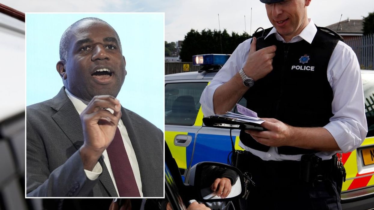 Deputy Prime Minister David Lammy and a police officer pulling a car over