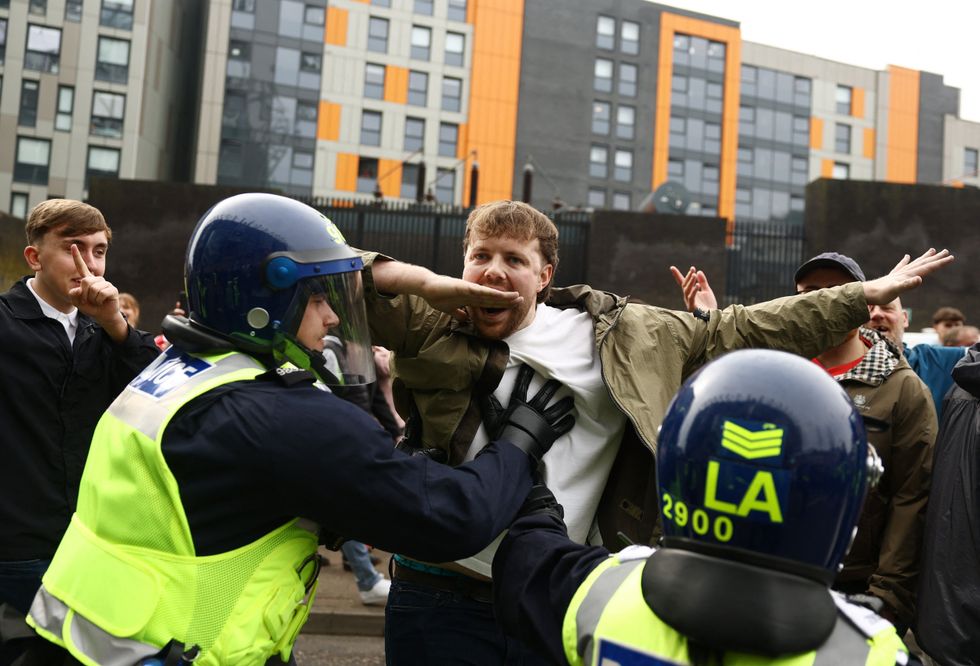 Despite a heavy police presence, fans still clashed before kick-off