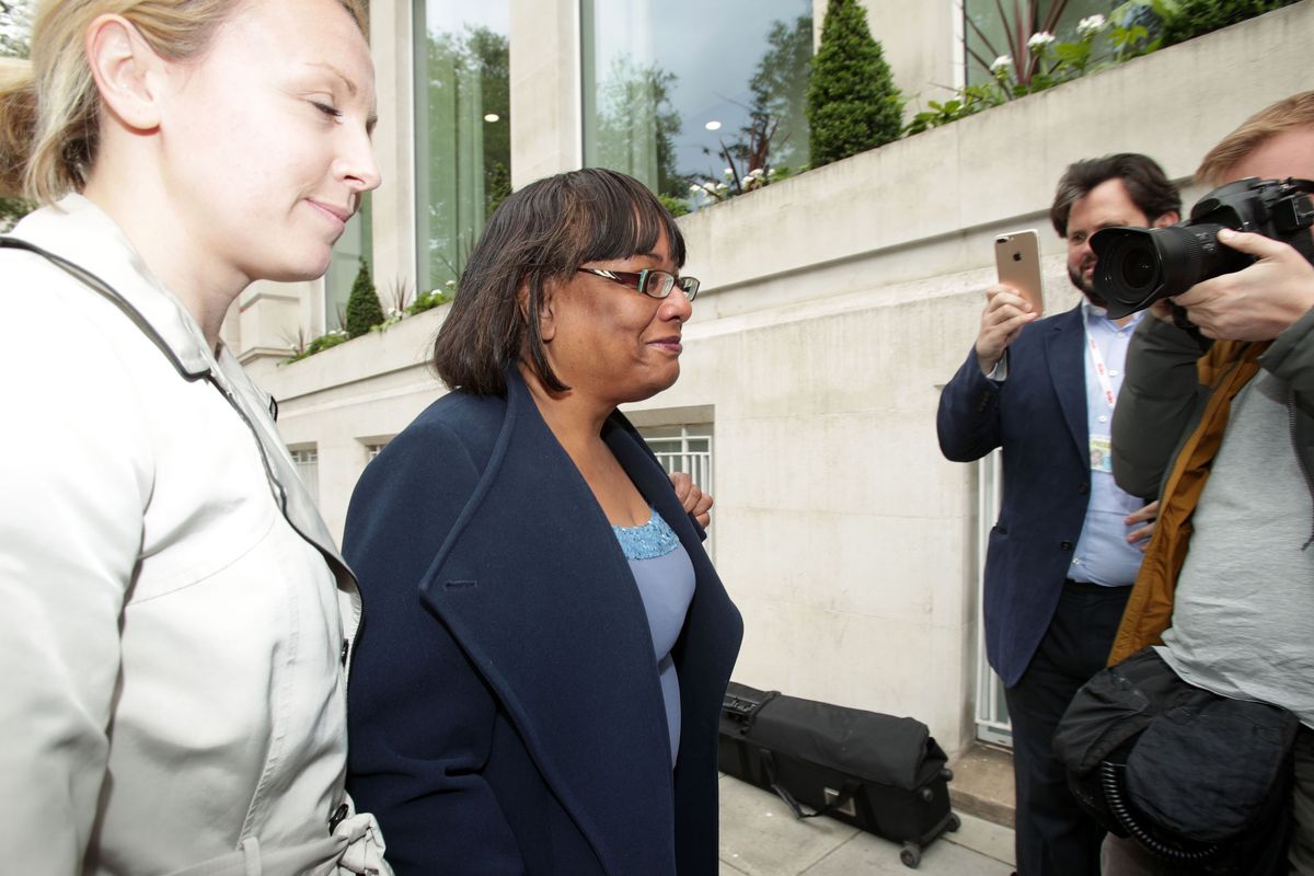Diane Abbott surrounded by press