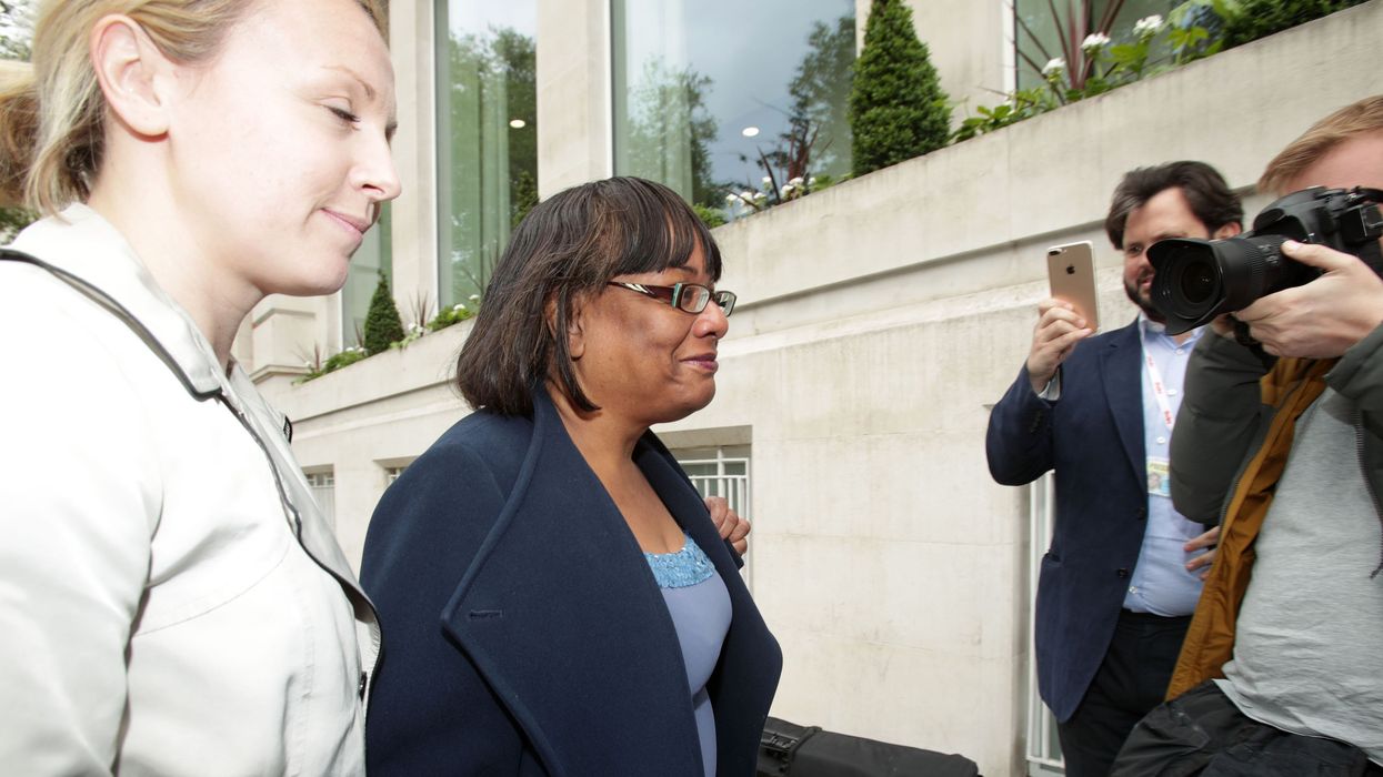 Diane Abbott surrounded by press