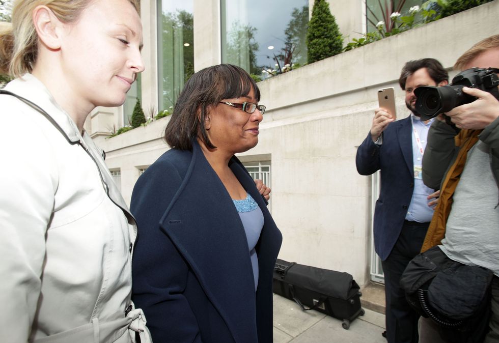 Diane Abbott surrounded by press