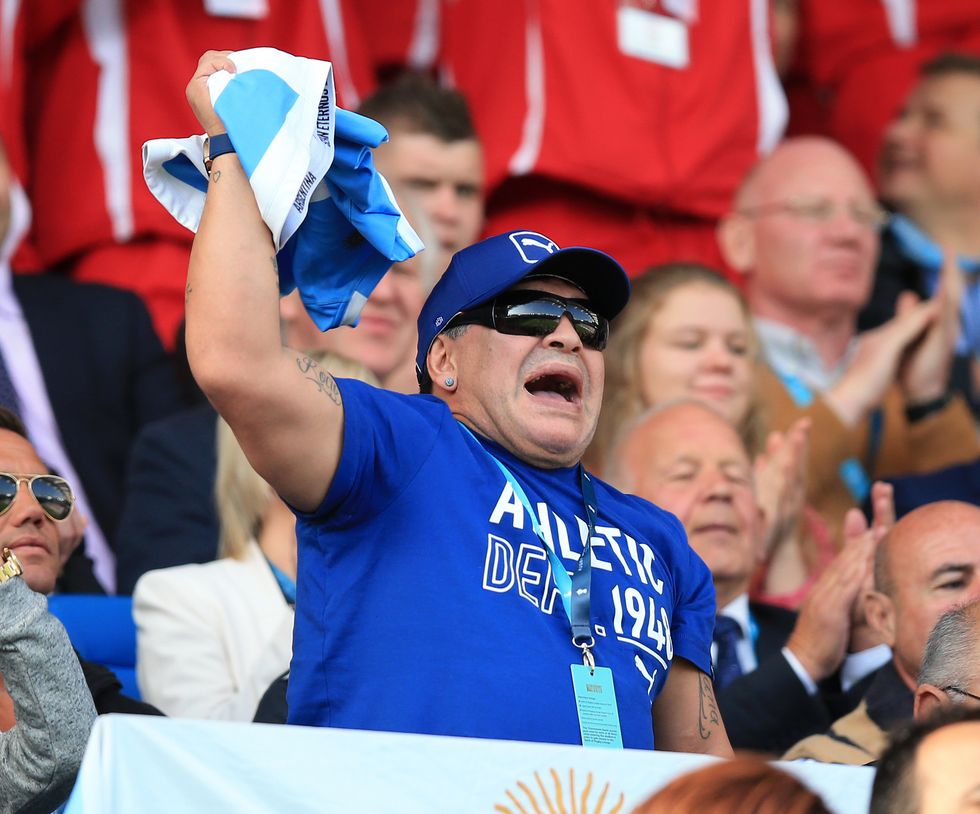 Diego Maradona cheers on his team during a match at Leicester City Stadium, Leicester.