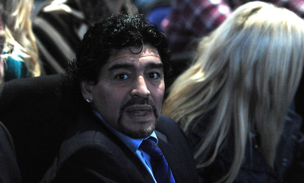 Diego Maradona looks on as Serbia's Novak Djokovic competes against Czech Republic's Tomas Berdych during day two of the Barclays ATP World Tennis Tour Finals at the O2 Arena, London.